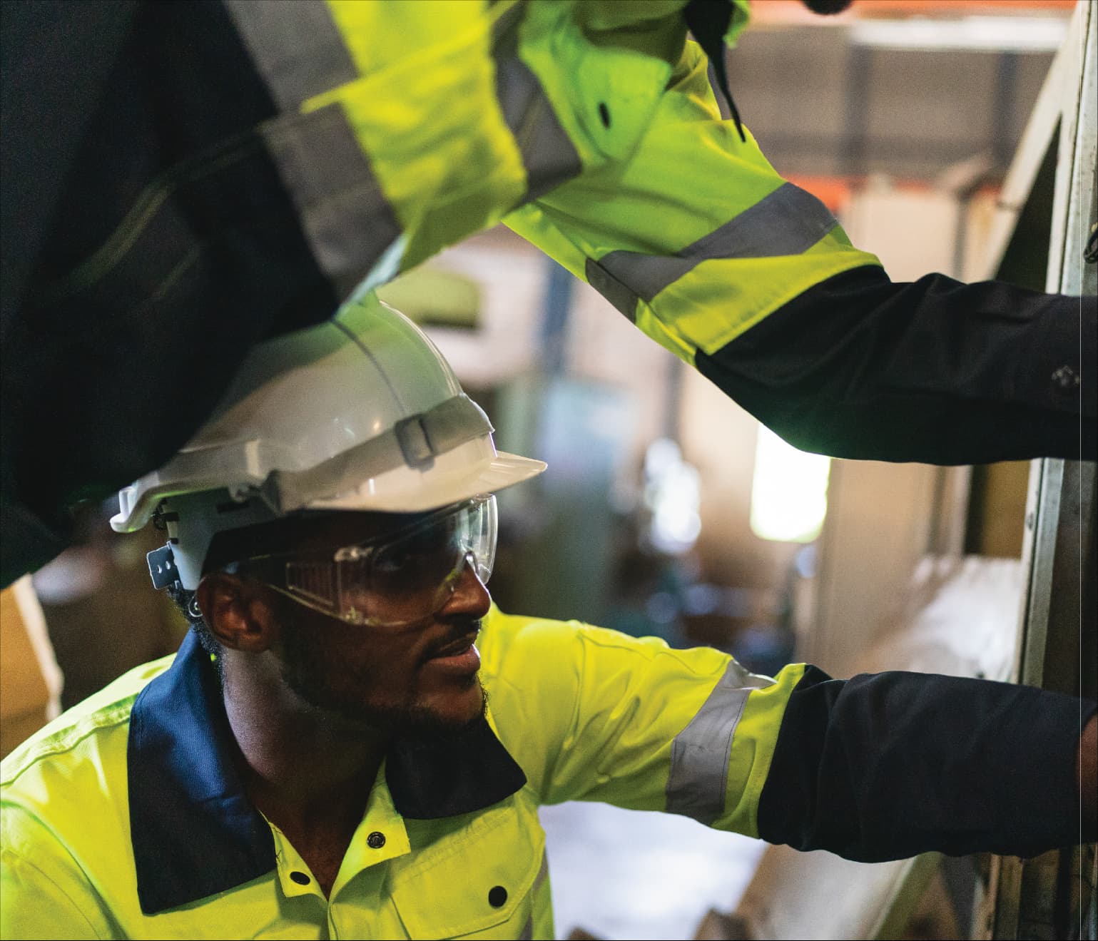 S.A.S Transition engineer in high-visibility PPE carrying out a site inspection